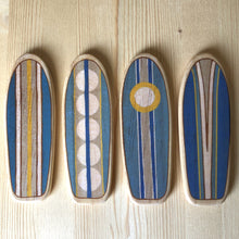 Load image into Gallery viewer, longboards with original designs on wooden baby mobile
