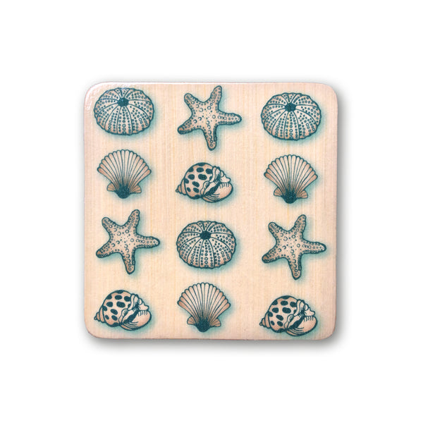 wooden art block with seashell design for boho beach nursery