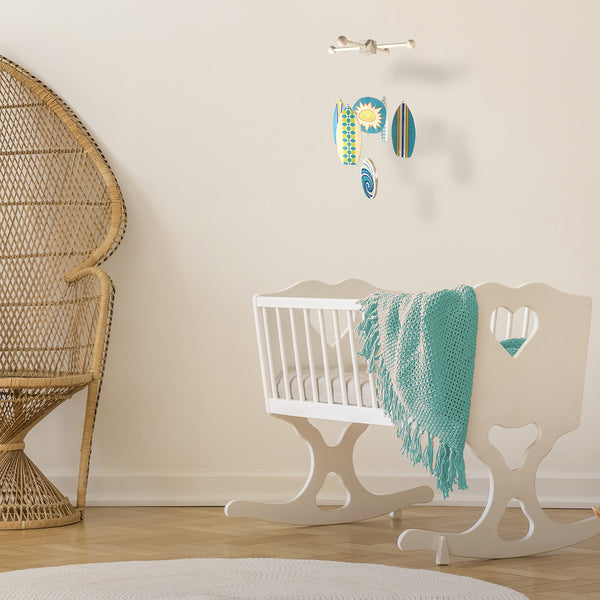 perfect crib mobile for a boho beach baby nursery